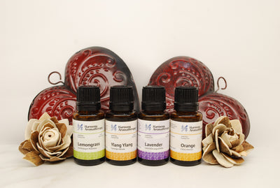 Love Bundle essential oils with two hearts and two flowers: lemongrass, Ylang Ylang, Lavender, and Orange