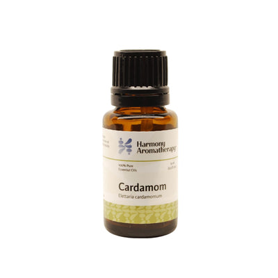 cardamom essential oil on white background