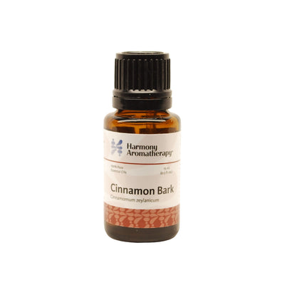 Cinnamon Bark essential oil on white background