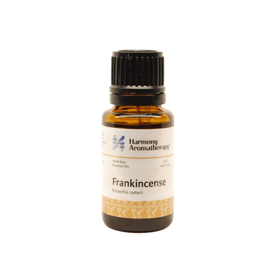 Frankincense essential oil on white background