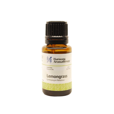 Lemongrass essential oil on white background
